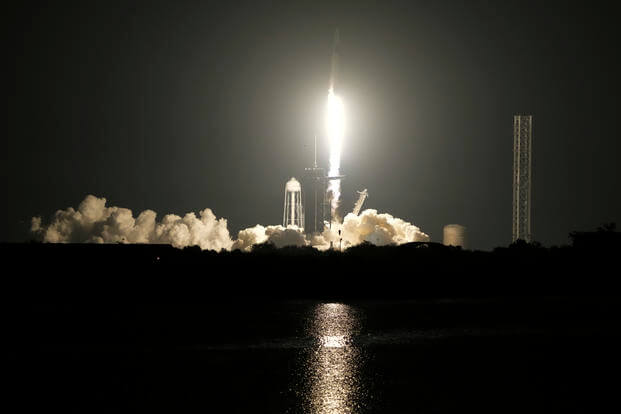 SpaceX Falcon 9 rocket with the crew capsule Endeavour lifts off from pad 39A