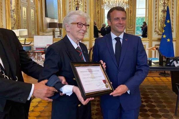 Colette Marin-Catherine at the Élysée Palace with French President Emmanuel Macron, where she was awarded for her and her brother Jean-Pierre’s contributions to the French Resistance. 