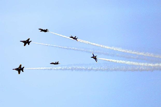 The Blue Angels break at the end of their show.