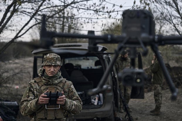 Ukrainian soldier launches a drone in Bakhmut, Donetsk region, Ukraine.