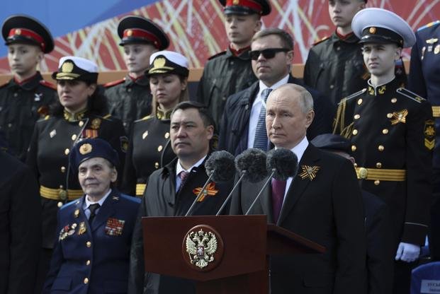 Russian President Vladimir Putin delivers his speech during the Victory Day military parade