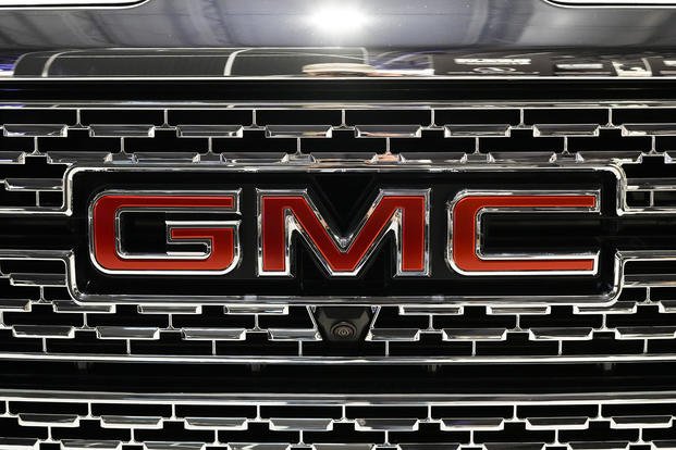 The GMC logo is shown at the Philadelphia Auto Show.