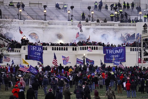 Violent insurrectionists loyal to President Donald Trump storm the U.S. Capitol in Washington. 