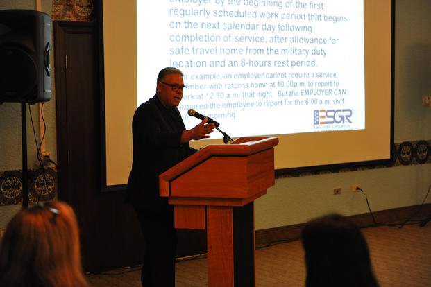 Agustin Rivera, program support specialist for the Employer Support of the Guard and Reserve (ESGR) in Puerto Rico, delivers a presentation on the Uniformed Services Employment and Reemployment Rights Act (USERRA) to more than 45 employers during a ‘Lunch with the Boss’ event on Fort Buchanan in Puerto Rico.