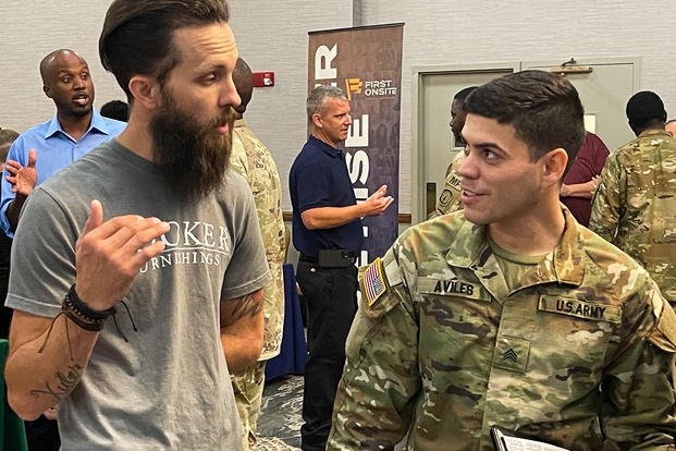 U.S. Army Sgt. Euleam Aviles, a wheeled vehicle mechanic assigned to 3rd Division Sustainment Brigade, 3rd Infantry Division, attends a national job fair at Fort Stewart, Georgia.