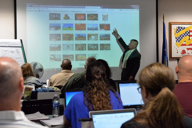 A veteran affairs benefits adviser discusses the eBenefits website during a Transition Assistance Program class at Wright-Patterson Air Force Base, Ohio.