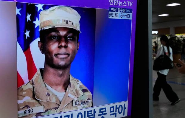 U.S. soldier Travis King during a news program at the Seoul Railway Station 