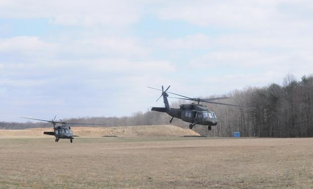 UH-60 Black Hawks, flown by U.S. Army Soldiers from 29th Combat Aviation Brigade, Maryland Army National Guard, take off at Aberdeen Proving Grounds, Md., during training April 5, 2014.