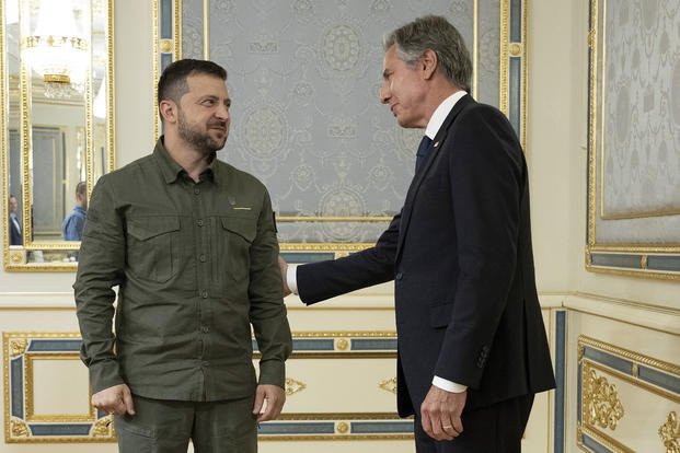 Ukraine's President Volodymyr Zelenskyy greets U.S. Secretary of State Antony Blinken