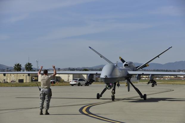 An MQ-9 Reaper remotely piloted aircraft assigned to the 163d Attack Wing taxis at March Air Reserve Base, California, on April 5, 2017, after making the Reaper's first-ever full stop landing at the base.