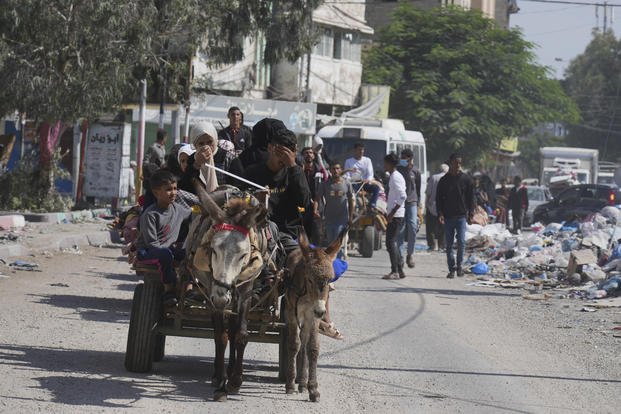 Palestinians flee from northern Gaza.