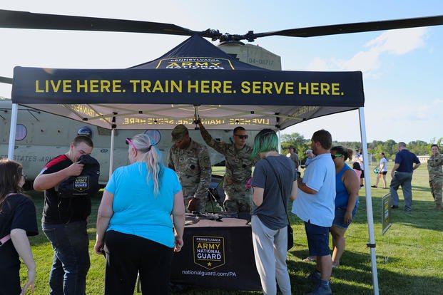 U.S. soldiers with the Pennsylvania National Guard attend National Night Out in Muhlenberg Township, Pennsylvania.