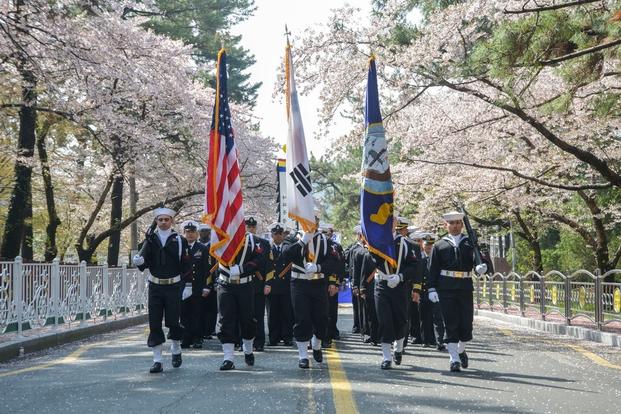 Sailors from Commander, Fleet Activities Chinhae (CFAC) join the local Chinhae community in a parade in honor of the 472nd birthday of ROK Navy Adm. Yi, Sun-sin.