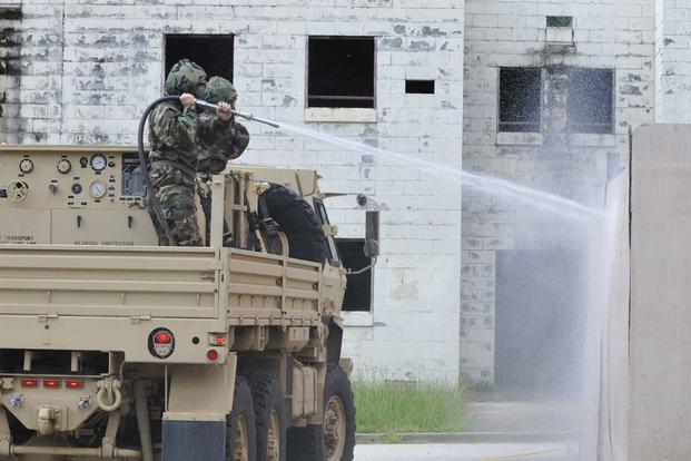 Soldiers conduct decontamination exercises at Fort McClellan