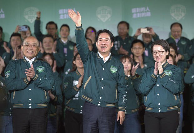 Taiwanese Vice President Lai Ching-te celebrates his victory.