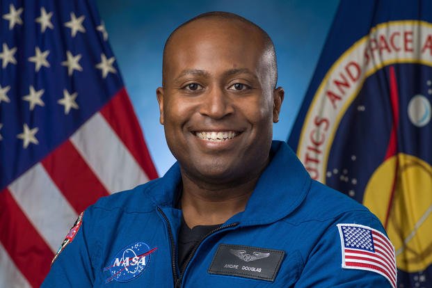 Coast Guard Academy graduate Andre Douglas, shown in a portrait taken on Dec. 3, 2021, was among 10 selected for NASA's 2021 Astronaut Candidate Program. 