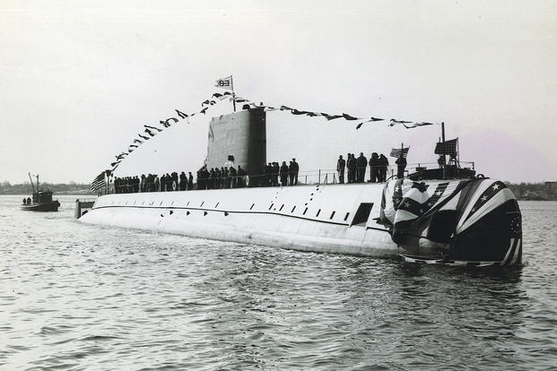 nuclear-powered submarine USS Nautilus (SSN 571) is in the Thames River after a christening ceremony