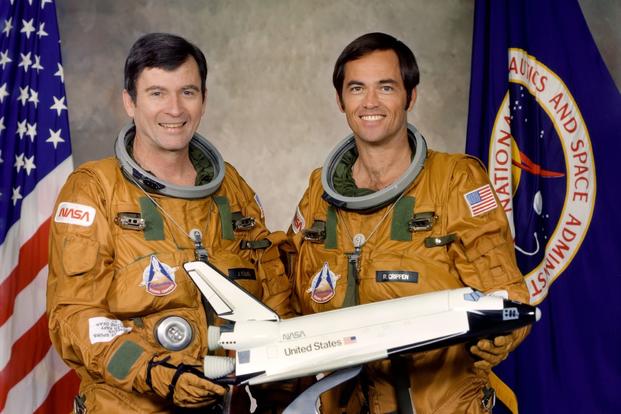 Astronauts John W. Young, left, commander, and Robert L. Crippen, pilot, crewed the space shuttle Columbia for the space shuttle’s first orbital flight test. 