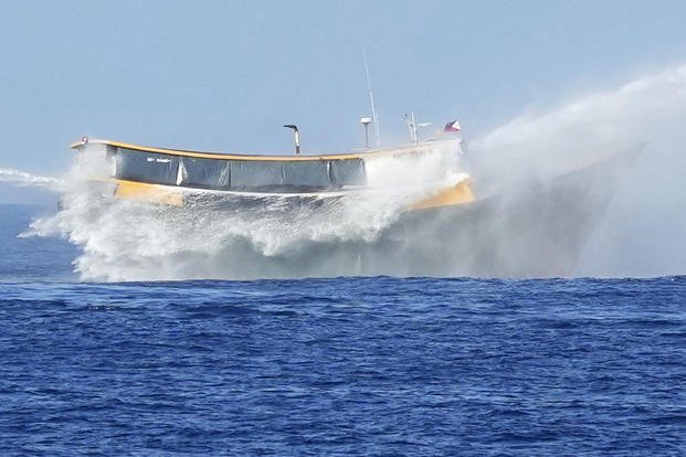 Philippine resupply vessel Unaizah May 4 is hit by two Chinese coast guard water canons