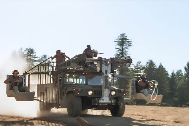 The Humvee’s job description includes troop transport and dino wrasslin’. 