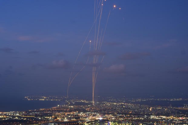 Israeli Iron Dome air defense system fires to intercept rockets that were launched from Lebanon