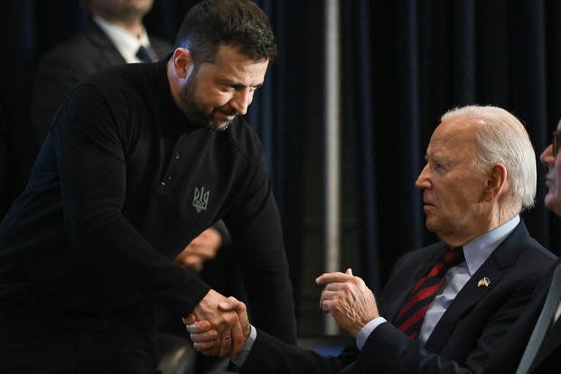 Ukrainian President Volodymyr Zelenskyy shakes hands with U.S. President Joe Biden at the 79th session of the United Nations General Assembly in New York.