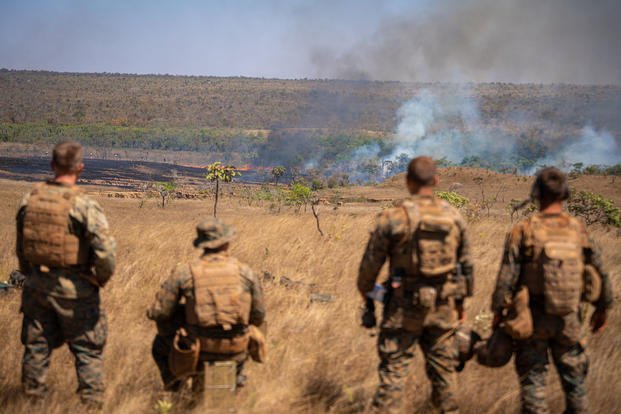 U.S. Marines with 1st Battalion, 24th Marine Regiment, watch a controlled fire during Exercise Formosa in Formosa, Brazil.