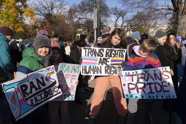 Children supporting transgender rights protest during a rally outside of the Supreme Court in Washington. 