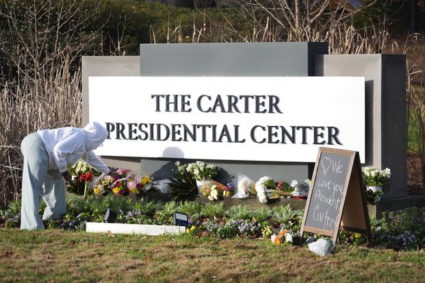  flowers at the entrance to The Jimmy Carter Presidential Center in Atlanta