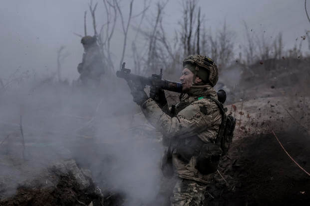 serviceman of the 24th Mechanised Brigade improves his tactical skills at the training field in Donetsk region