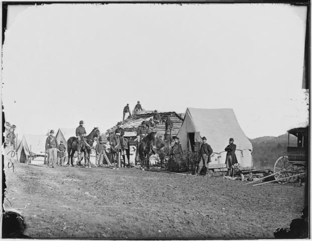 Union Army soldiers build winter quarters in this undated photo. 