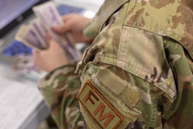 A U.S. Air Force financial management duty identifier patch is seen on an Airman