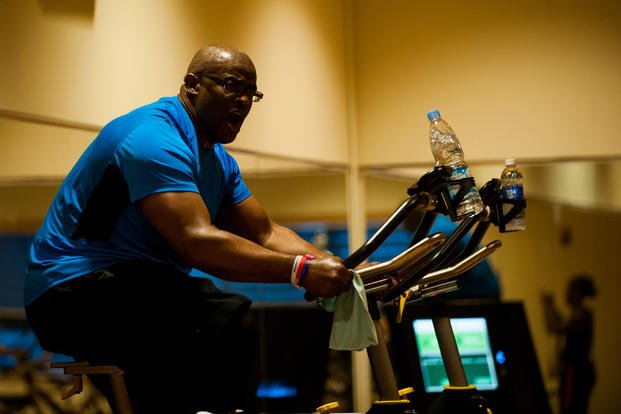 Master Sgt. Dante Brooks, 8th Operations Support Squadron host aviation resource management superintendent, leads a spin class at Kunsan Air Base, Republic of Korea.