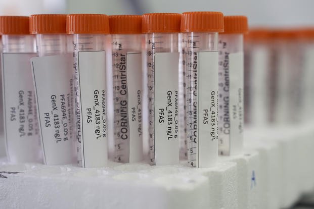 Vials containing PFAS samples sit in a tray, Wednesday, April 10, 2024, at a U.S. Environmental Protection Agency lab. 