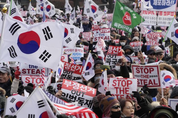 Supporters of impeached South Korean President Yoon Suk Yeol attend a rally