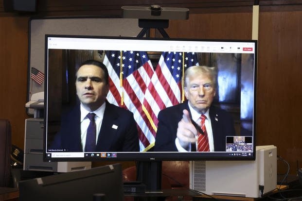 U.S. President-elect Donald Trump appears remotely for a sentencing hearing