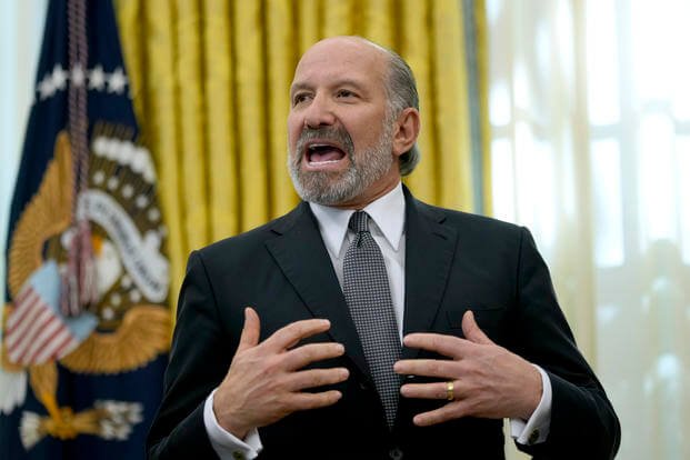 Commerce Secretary nominee Howard Lutnick speaks in the Oval Office