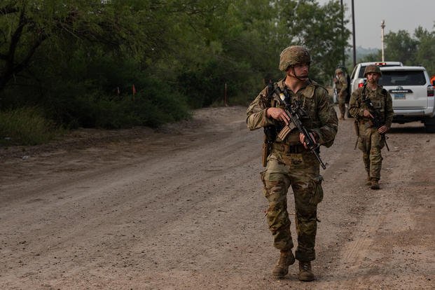 South Carolina Army National Guard soldiers, assigned to 132nd Military Police Company, 168th Military Police Battalion, 90th Sustainment Brigade, Task Force Tough Hombres, conduct foot patrols along the southern border near Rio Grande City, Texas.