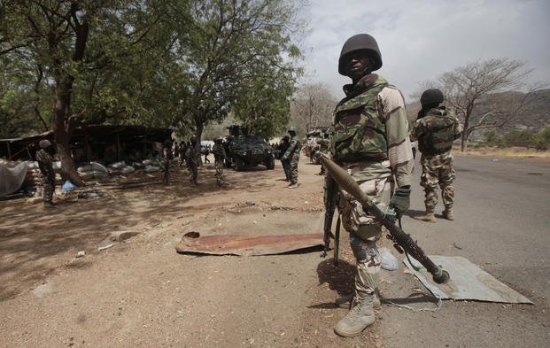 Nigerian soldiers man a checkpoint in Gwoza, northeast, Nigeria