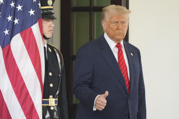 President Trump waiting to greet Canadian Prime Minister Mark 