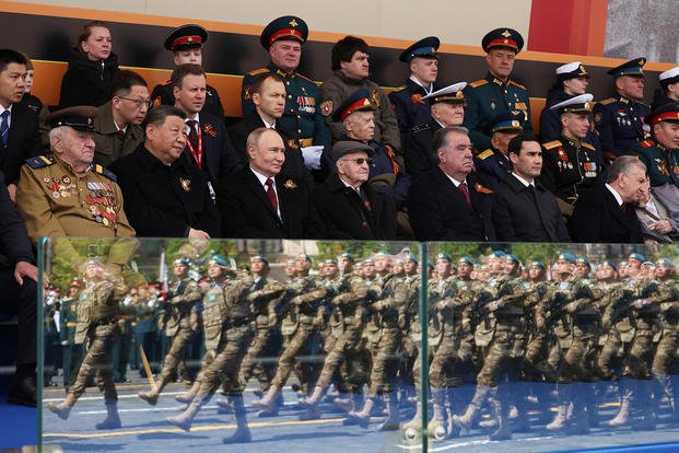 President Vladimir Putin and foreign leaders attend the Victory Day military parade 