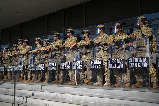 California National Guard stand in formation guarding the federal building in downtown Los Angeles
