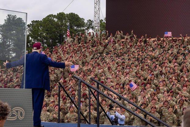 President Donald Trump greets troops at at Fort Bragg