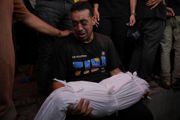 Abdel Hadi Bashir mourns the loss of his two daughters, Sabah and Mira who were killed in an Israeli army airstrike