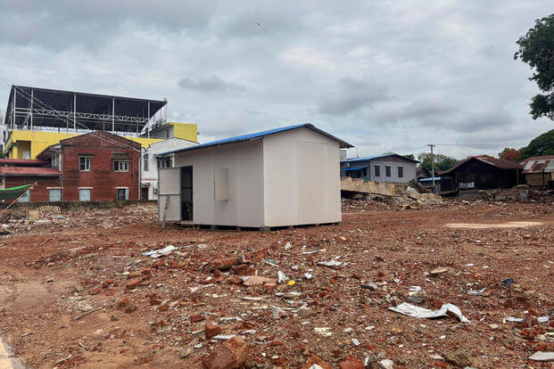 A temporary building is seen after clear collapsed building caused by strong earthquake in Naypyitaw, Myanmar