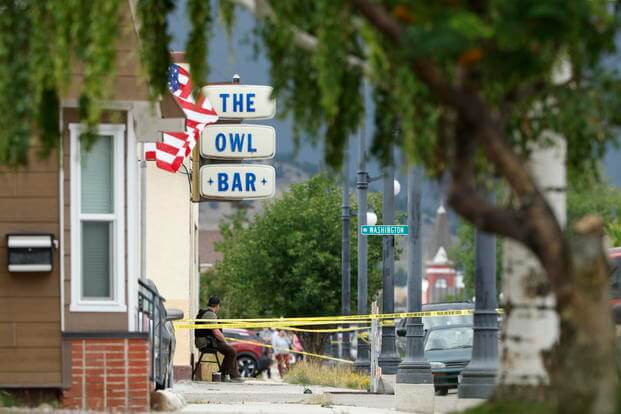 Police tape surrounds The Owl Bar in Anaconda, Montana.