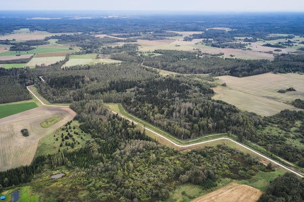 A drone shows an aerial view of the Estonia-Russia border near Vinski, Estonia