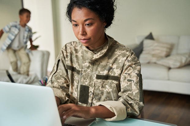 Woman at computer.
