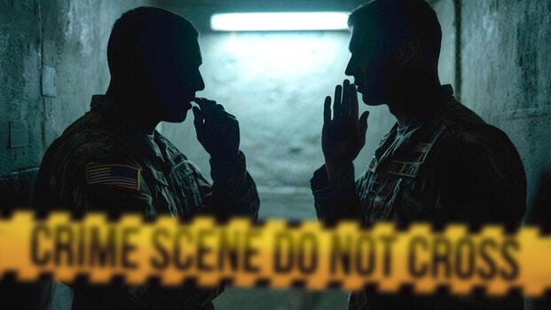 Two shadowy soldiers discussing coverup.