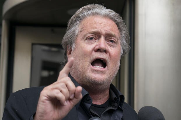 Steve Bannon speaks to the media as he departs the federal court in Washington, Thursday, July 21, 2022. Bannon was brought to trial on a pair of federal charges for criminal contempt of Congress after refusing to cooperate with the House committee investigating the U.S. Capitol insurrection on Jan. 6, 2021. (AP Photo/Jose Luis Magana)